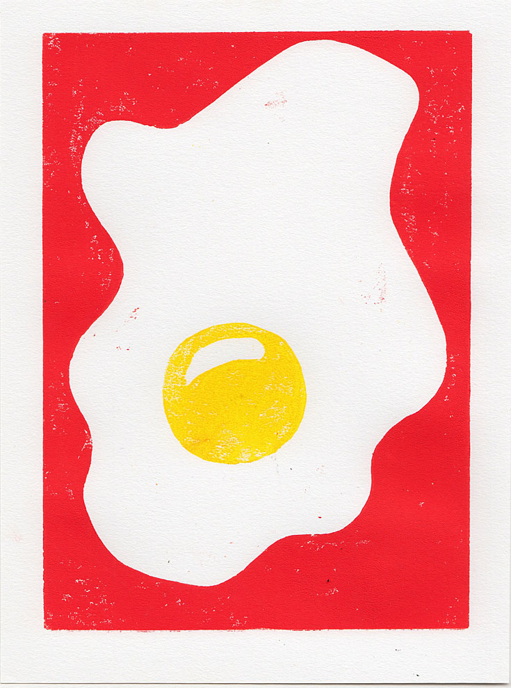 woodblock print of a fried egg sunny side up with a red background