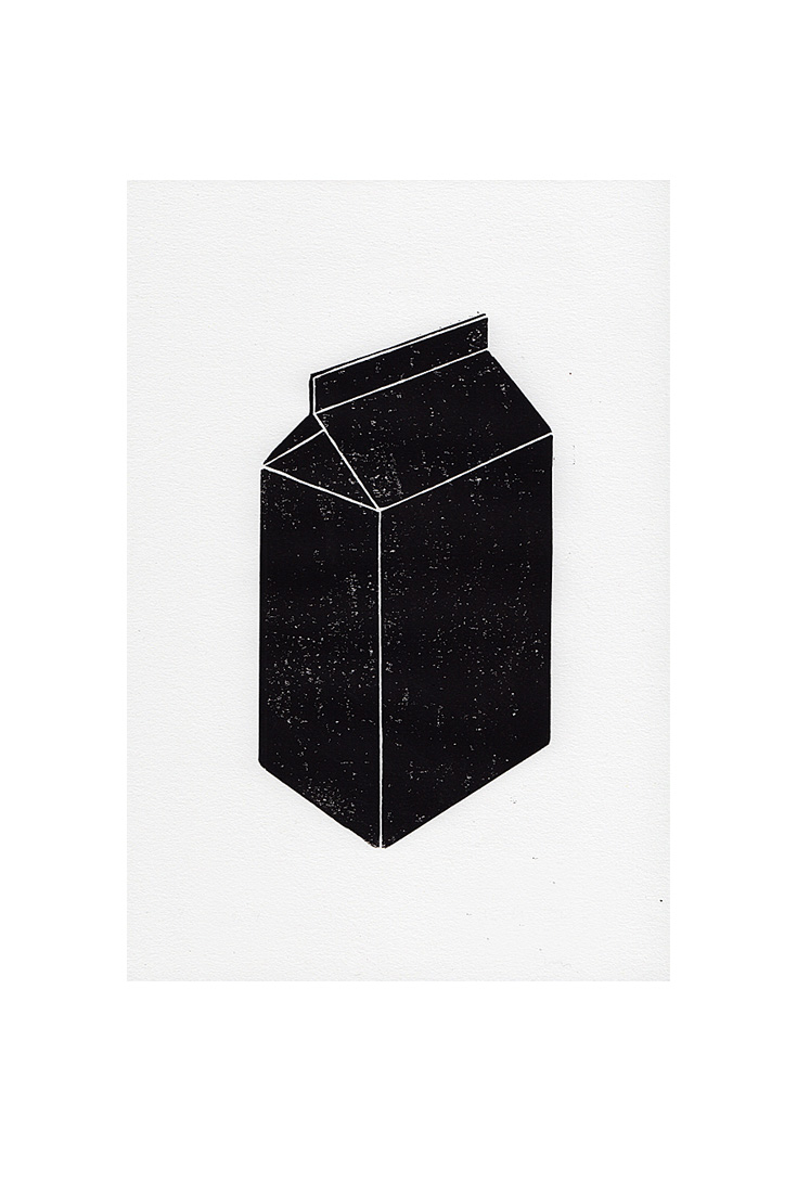 black and white woodblock print of a milk packaging